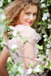 model posing in white flowers