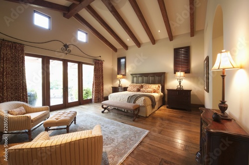 Photo: Spacious high beamed bedroom Spacious high beamed bedroom