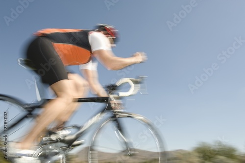 Photo: Male cyclist, blurred motion Male cyclist, blurred motion