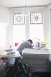 mid adult man sleeps at his desk