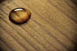 Waterdrop on a wooden surface. Waterdrop on a wooden surface.