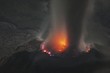 Molten lava glows in volcanic crater of Santiaguito, Santa Maria, Guatemala