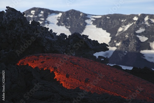 Photo: Molten lava flows from Mount Etna in Sicily, Val de Bove Molten lava flows from Mount Etna in Sicily, Val de Bove
