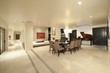 Spacious white living interior with grand piano