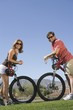 Photo: Mature couple on cycling holiday, face to face Mature couple on cycling holiday, face to face