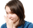 Woman covering her nose