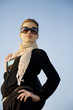 Young pretty woman on the clear sky