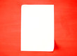A piece of paper on a red background