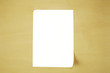 A piece of paper on a wood background