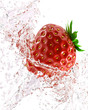 fresh strawberries in a spray of water