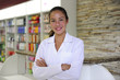 portrait of a female pharmacist at pharmacy