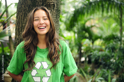 Photo: environmental activist in the forest wearing recycle t-shirt environmental activist in the forest wearing recycle t-shirt