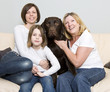 Three Generations of a Family with their Dog