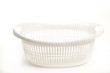 white plastic laundry basket