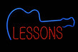 Guitar Lessons Neon Sign