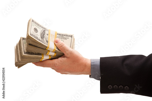 Photo: Man Handing Over Hundreds of Dollars Man Handing Over Hundreds of Dollars
