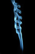 Blue smoke on black background