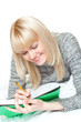 woman writing and smiling