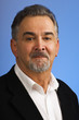 Portrait of mature man against blue background Portrait of mature man against blue background