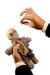 Photo of Businessman making voodoo to co-worker