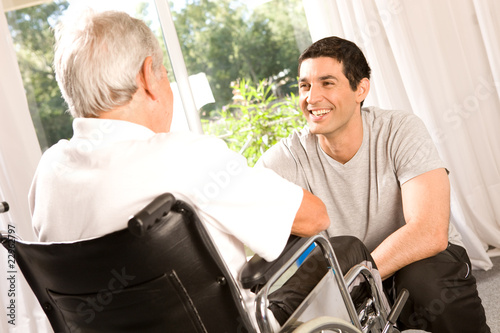 Photo: Young volunteer in retirement house Young volunteer in retirement house