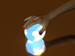 Hand and Luminous globe