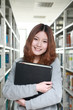 young asian girl in library young asian girl in library