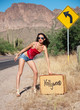 Beautiful woman hitching a ride to Hollywood