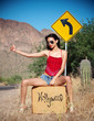Beautiful woman hitching a ride to Hollywood