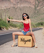 Beautiful woman hitching a ride to Hollywood