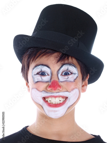 Photo: smiling boy with painted face isolated on white background smiling boy with painted face isolated on white background