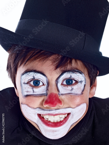 Photo: smiling boy with painted face isolated on white background smiling boy with painted face isolated on white background