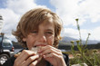 Boy eating a sandwich