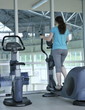 Photo: people running on threadmill at fitness club people running on threadmill at fitness club
