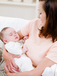 Sleeping newborn on the woman's hand Sleeping newborn on the woman's hand