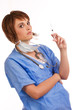 Foto: Young female doctor holding filled syringe Young female doctor holding filled syringe