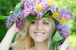 smiling girl in summer flowers