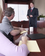 Financial Advisor talking to clients