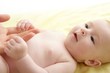 nude blond baby playing mother hands nude blond baby playing mother hands
