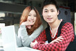 couple of asian using laptop
