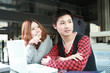couple of asian using laptop