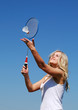 nise woman is plaing badminton nise woman is plaing badminton