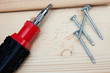 screwdriver, screws and wood planks screwdriver, screws and wood planks