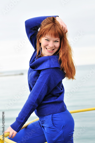 Photo: cheerful redheaded girl cheerful redheaded girl