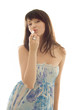 Pretty woman kissing lipstick