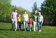 happy family of six on the nature