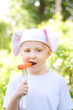 Child with bunny ears