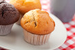 muffin on checkered tablecloth muffin on checkered tablecloth