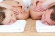Young couple receiving a back massage