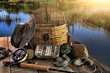 Photo: Traditional fly-fishing rod with equipment in late afternoon Traditional fly-fishing rod with equipment in late afternoon